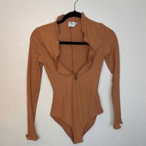 Princess Polly Ruffled neckline and wrist hem bodysuit